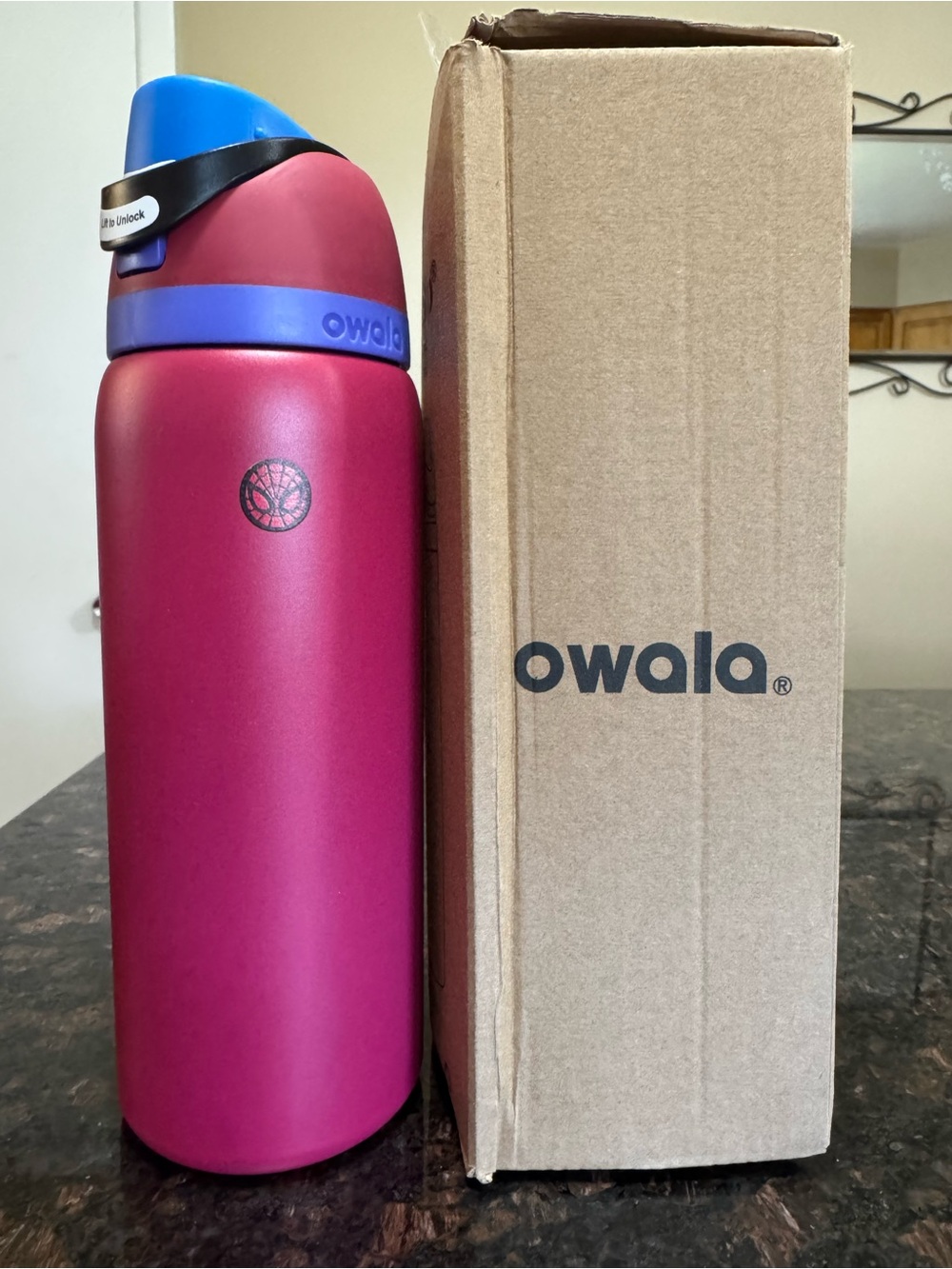 Owala Insulated Water Bottle with Spider-Man logo